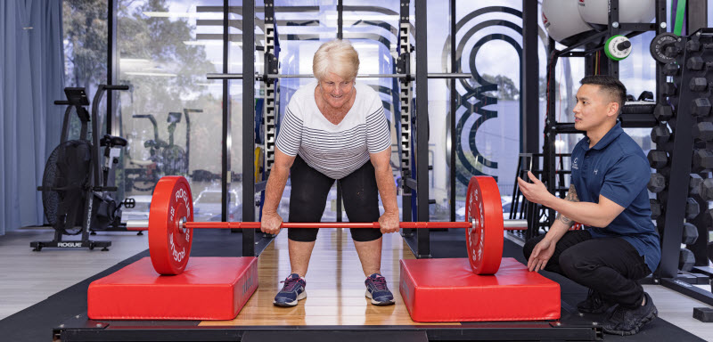 Senior woman lifting a dumbbell