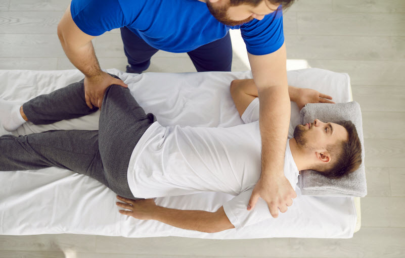 Injured man doing a therapy